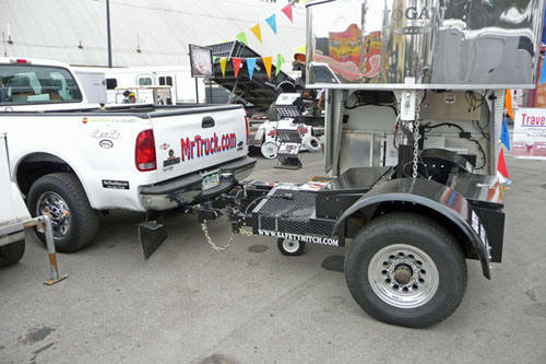 Automated Safety Hitch, adds an axle to your pickup truck