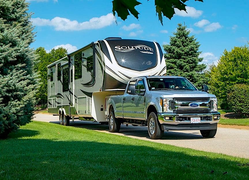 6AmazingLuxury5thWheelsjpg Pickup truck towing advice reviews accessories and safety tips Pickup truck towing a 5th wheel travel trailer with the kingpin hitch visible in the